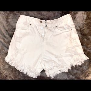 Cute distressed white shorts